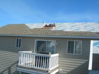 Bozeman MT re-roof dried in titanium underlyament Harmon Enterprises Constuction Inc