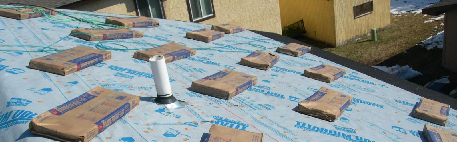 Bozeman MT re-roof dried in titanium underlyament Harmon Enterprises Constuction Inc