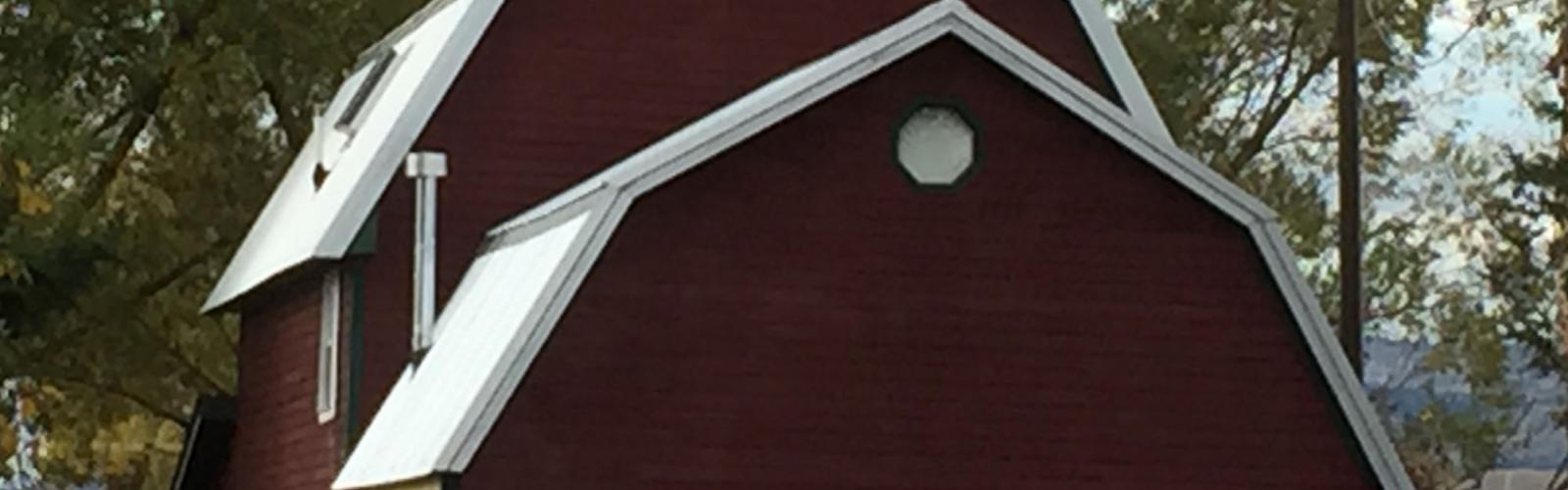 metal roof and painted siding and trim