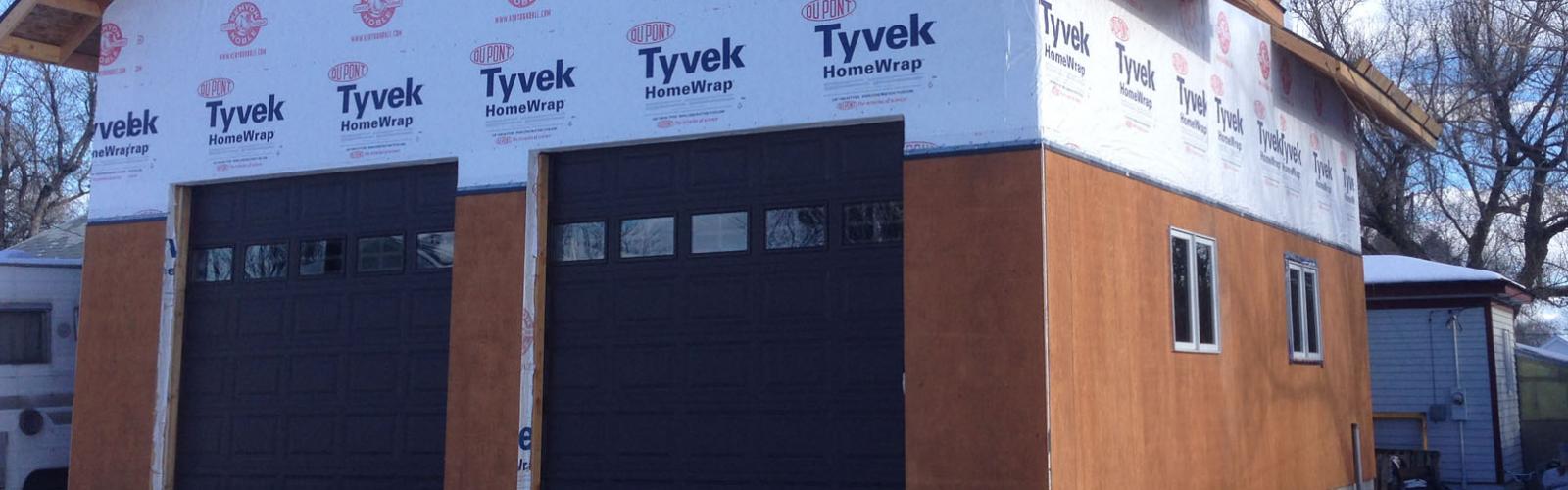 garage doors installed in shop building